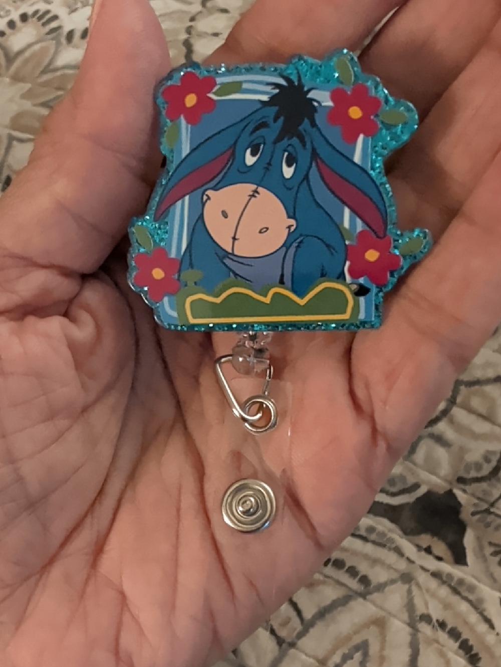 Eeyore Blue Glitter Badge Reel with Flowers